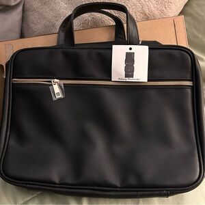 Black Makeup Weekender with gold zippers